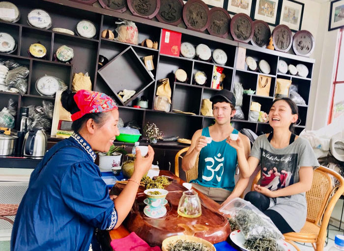 Ashley and Jack drink tea in Yunnan